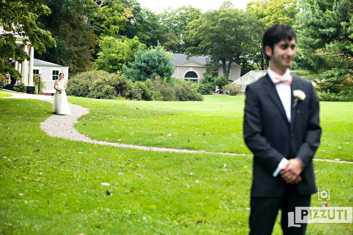 bride walking down to the reveal of the first look