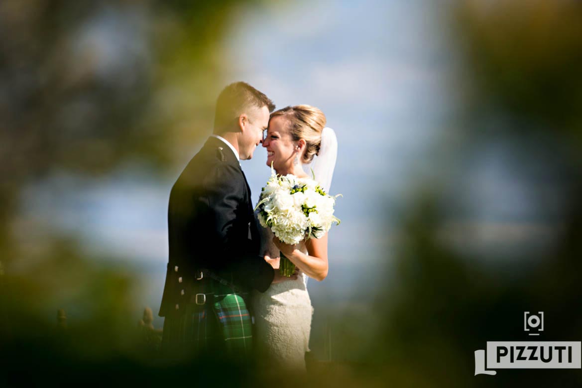 The bride and groom during a first look on Cape Cod