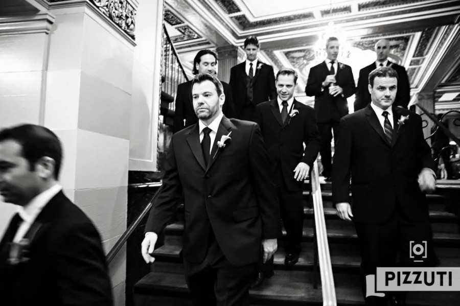 Groomsmen Walk Out Of The Omni Parker Hotel