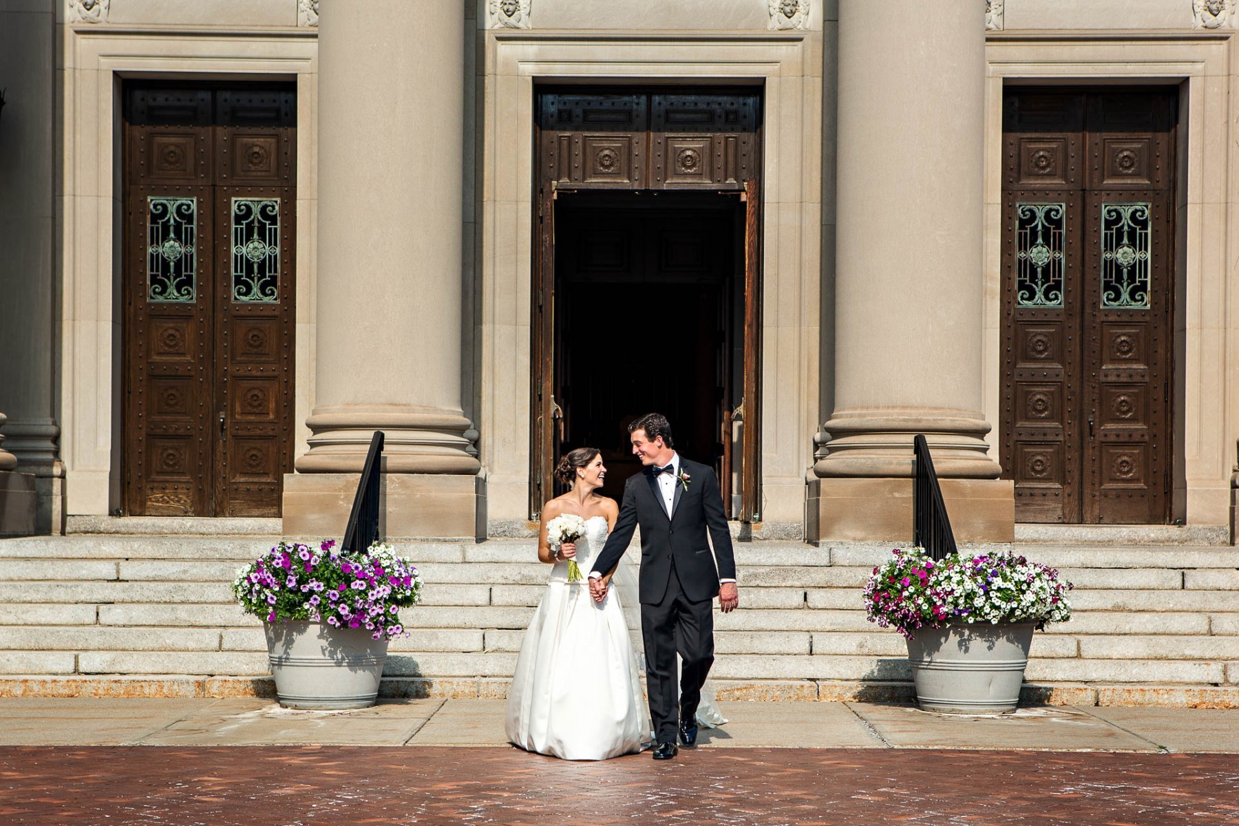 couple-exiting-chapel-holy-cross