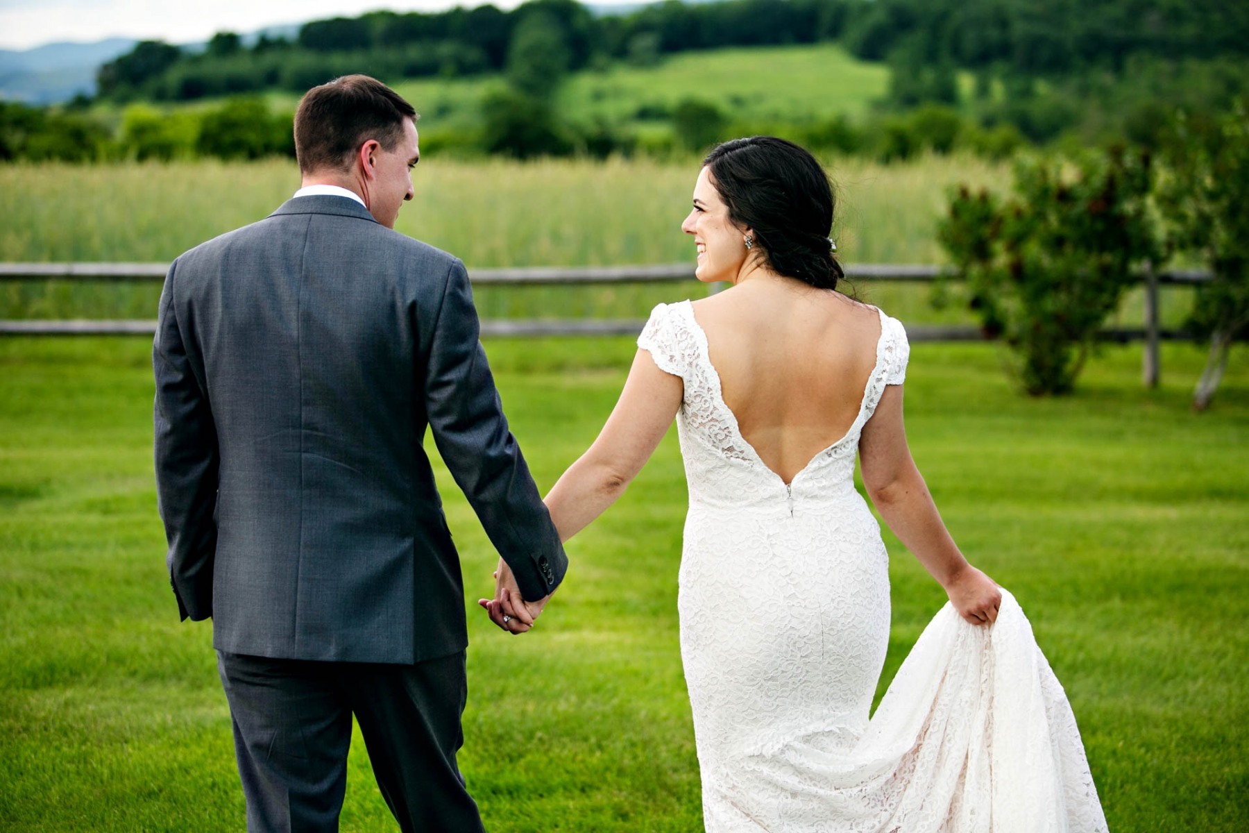 bride-groom-walkingvermont-farm-wedding