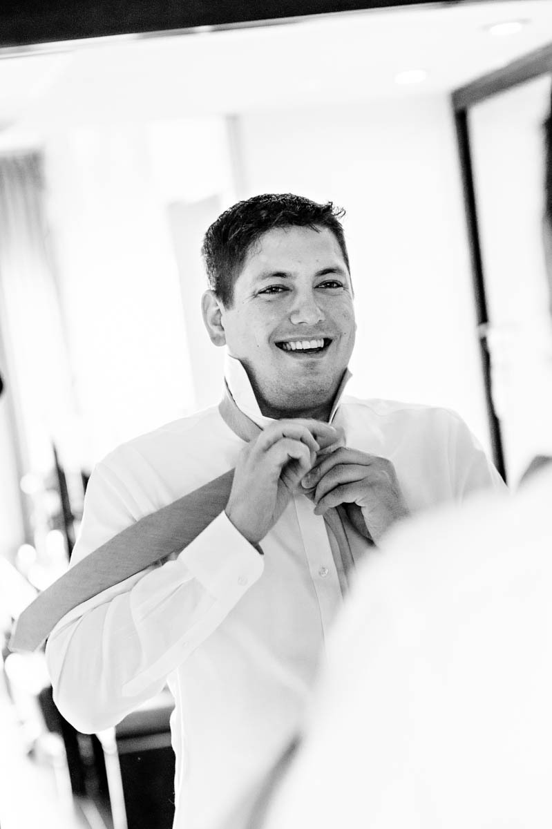 groom-getting-ready-tie