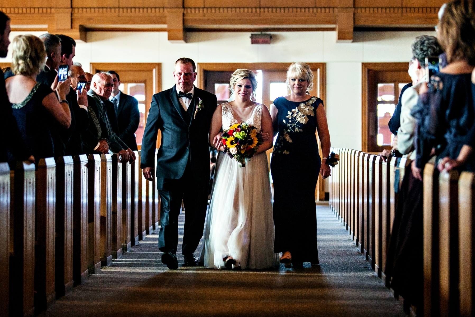 bride-parents-walking-down-aisle